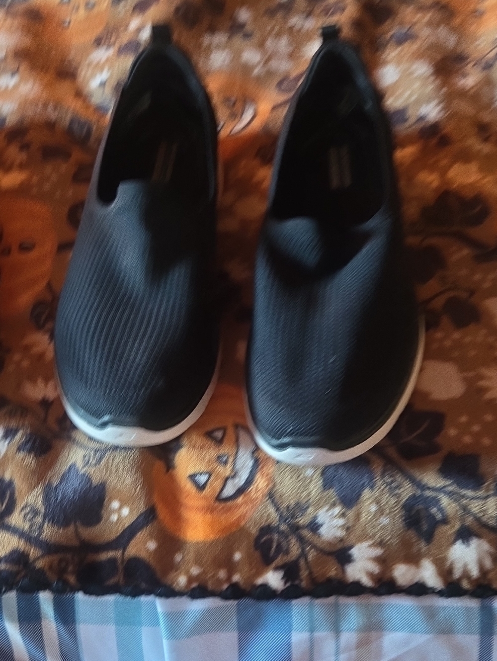 Skechers Black Slip-On Knit Sneakers with White Sole